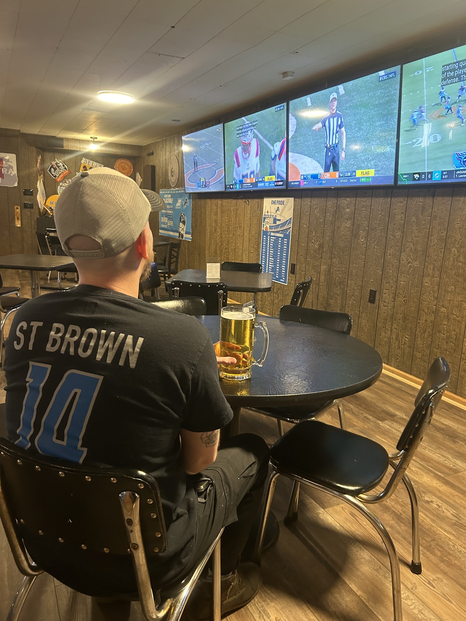 Saranac interior with TVs, Lions game